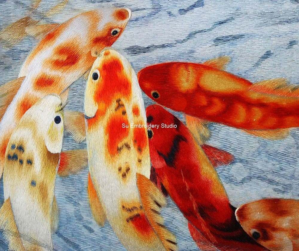 closeup of hand embroidered koi picture