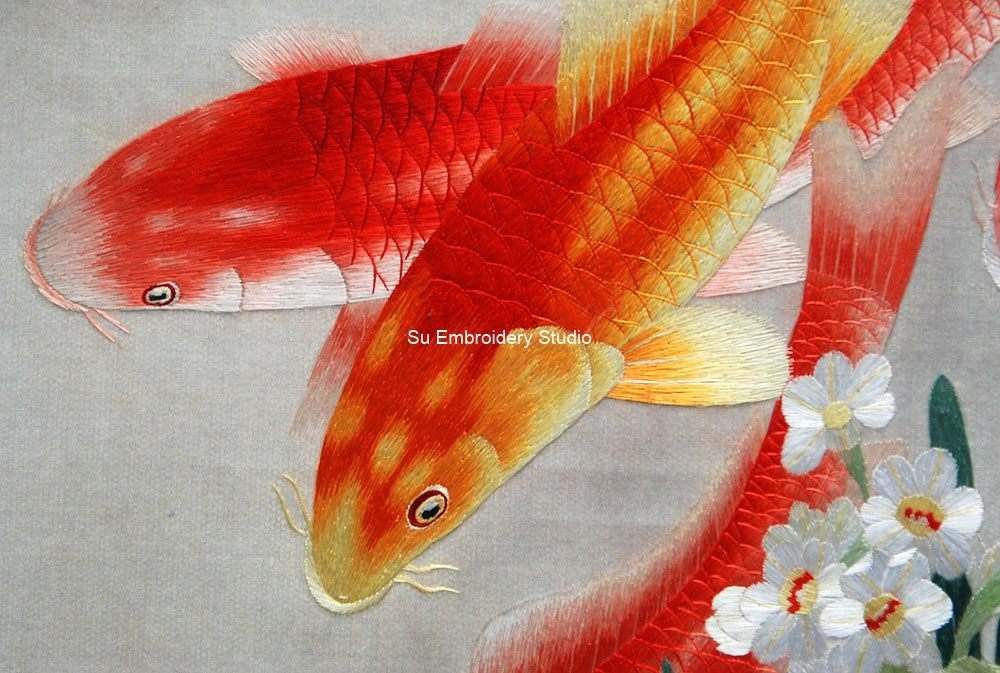 closeup of silk embroidered koi fish